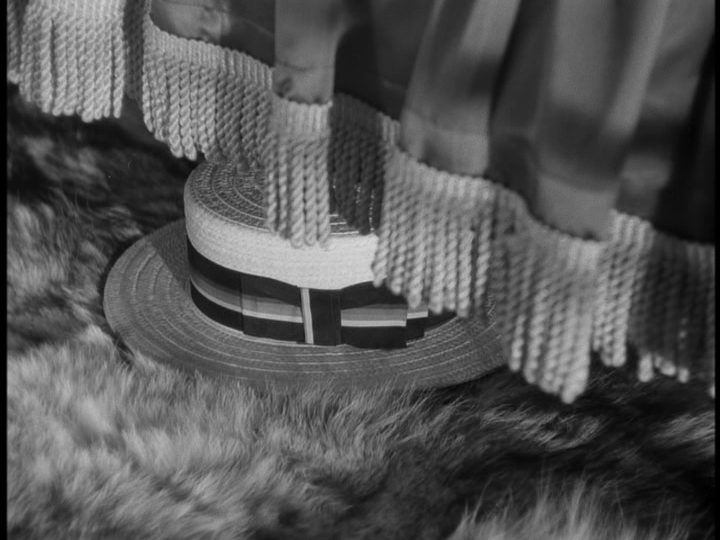 First close-up of Johnny's hat